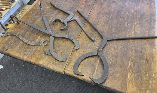 4pc. Antique Railroad Tools - Track & Tie Tongs: Description: This lot includes four antique railroad tools. Three railway track and tie tongs and one wrench. Wrench is marked "N.Y.C & H.R". Tongs are marked "N.H.R.R."Condition: ware associated with