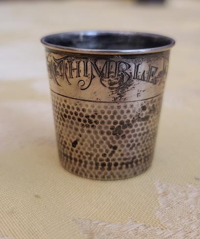 Sterling Silver Oversize Thimble Shot Glass: Description: This lot includes a sterling silver oversized thimble shot glass. Condition: Shot glass is in excellent condition, just needs a good polishing. Comments: This shot glass is antique in age