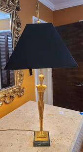 Patinated Bronze Figural Table Lamp by Tom Corbin: Description: This lot includes a single table lamp attributed to Tom Corbin. The lamp appears to be gilt bronze. The only markings we could find are "EX NY" on the base. Condition: Surface ware associ