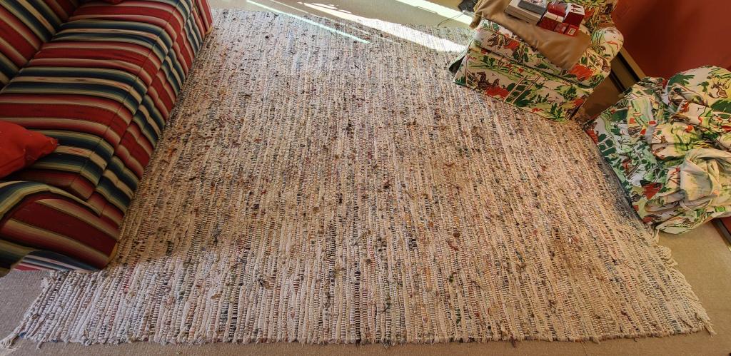 Unique Woven Rug - 10' 6" x 8' 3": Description: This lot includes a unique design woven area rug. Condition: Surface ware associated with age and use, otherwise in overall good condition. Location: Lot is located on the first floor of 