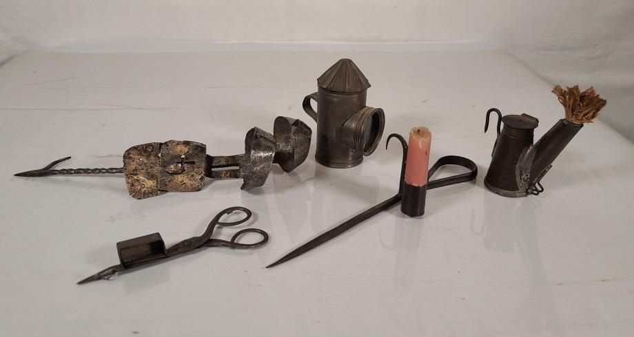 Grouping of Antique Miners & Whale Oil Lamps: Description: This lot includes 5 early lanterns & a candle cutter. The lot features several miners lanterns, and a Whale oil double betty lamp. These all appear to date to the 19th century and earlier
