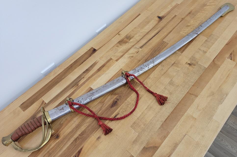 Reproduction Civil War Style Sword: Description: This lot includes a well crafted reproduction civil war era sword. See photos for details Condition: Surface wear associated with age and use, otherwise in overall good, used condition. M