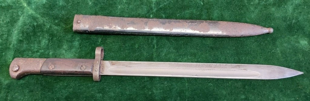 WWII Czech Mauser Bayonet - #1: Description: This lot includes a WWII Czech Mauser Bayonet with original scabbard. Minor surface rust to the scabbard but otherwise in good condition.