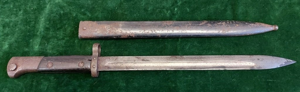 WWII Czech Mauser Bayonet - #2: Description: This lot includes a WWII Czech Mauser Bayonet with original scabbard. Minor surface rust to the scabbard but otherwise in good condition.