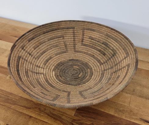 Native American Woven Basket: Description: This lot includes a native American woven basket likely from the New Mexico region. Condition: Minor expected surface wear associated with age and use, otherwise in overall good condition