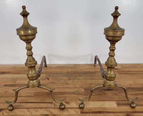 Pair of Brass Chippendale Style Andirons: Description: This lot includes a pair of brass Chippendale style andirons. See photos for details. Condition: Expected surface wear associated with age and use, otherwise in overall good condition. Me