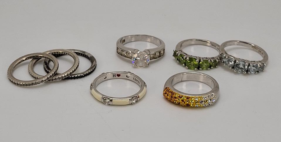 8pc. Sterling Silver Rings: Description: This lot includes eight sterling silver rings. Each ring is marked sterling with many pieces being signed. See photos for details. Condition: Pieces are in estate found condition, with mi