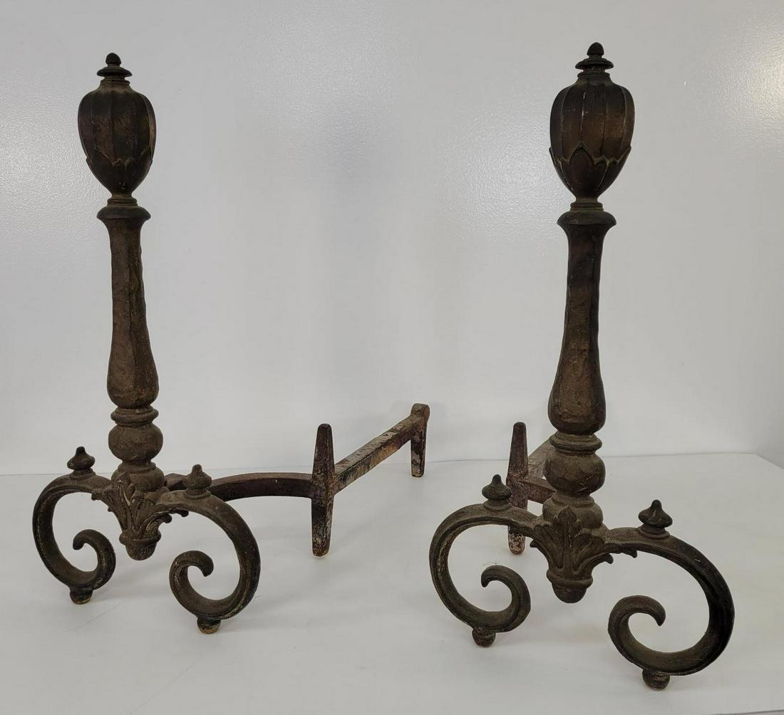 Pair of Bradley & Hubbard Cast Iron Andirons: Description: This lot includes a pair of original late 19th century cast iron andirons manufactured by Bradley & Hubbard. Marked on the arms. This piece comes directly out of an estate collection of o