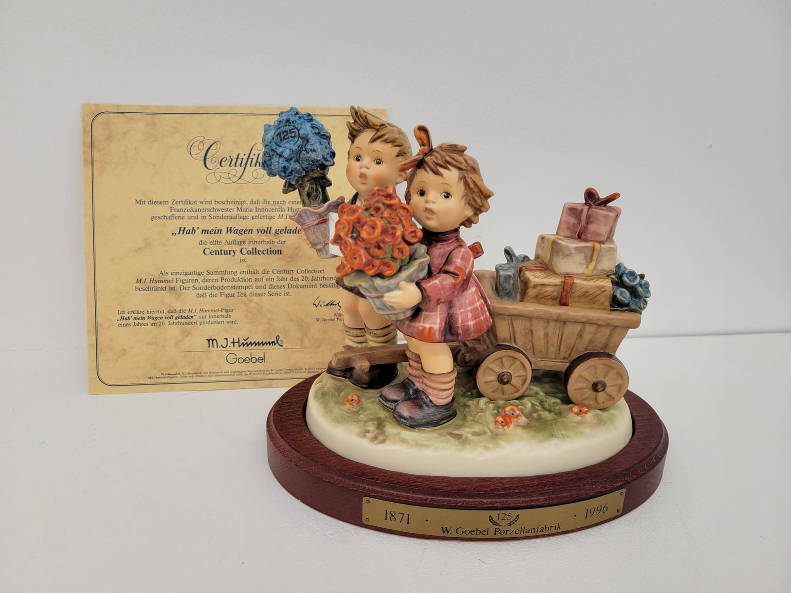 Hummel "Love's Bounty" - Figure #751: Description: This lot includes the Hummel figure titled "Love's Bounty" Figure #751. This lot is part of a large 500 piece collection we will be selling in this auction! You get all of the pieces in t