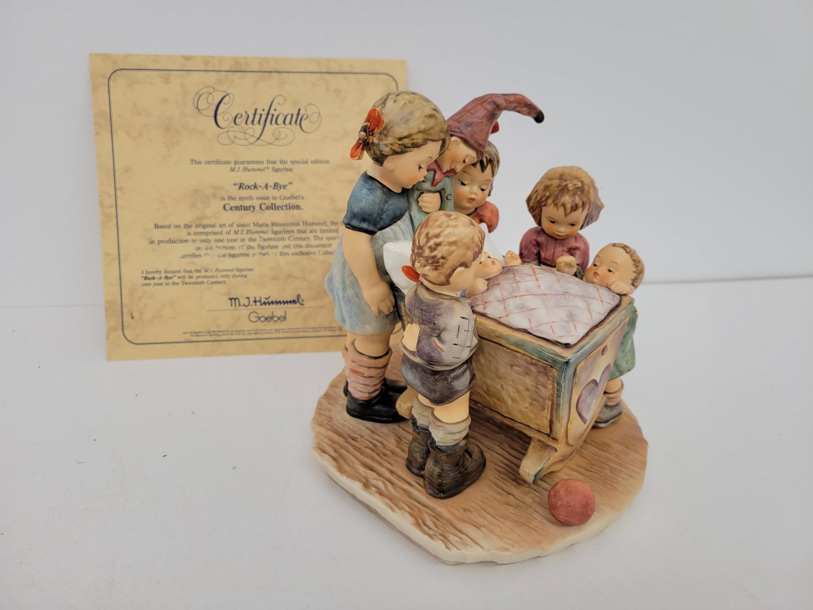Hummel "Rock-A-Bye" - Figure #574: Description: This lot includes the Hummel figure titled "Rock-A-Bye" Figure #574. This lot is part of a large 500 piece collection we will be selling in this auction! You get all of the pieces in the 