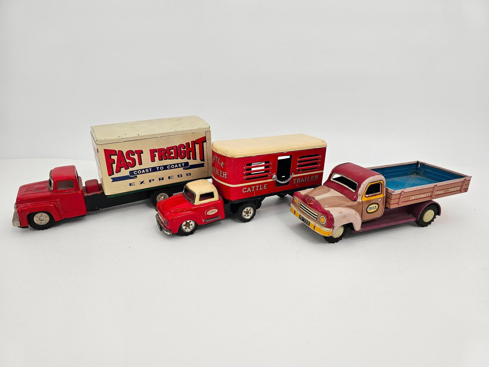 (3) Three Vintage Tin Lithograph Friction Trucks (1 of 13)