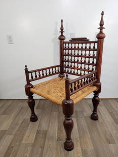 Antique Pakistani Punjabi Tribal Chair: Original cane seat, turned wood throughout. Appears early 20th century in age, very solid. Some look areas of cane on the seat, otherwise in good condition Measurements: 23"L x 21"W x 42"H