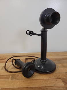 Western Electric 20AL Candlestick Phone: Finish, cord, & paint look to be original and in overall good condition. Plaque on speaker reads "Property of American Tel & Tel Co 337" Measurements: 11"H