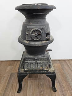 Atlanta Stove Works No. 40 Cast Iron Parlor Stove: The stove is a lovely smaller size, marked on the upper and lower doors. Appears to be complete and in good condition for it's age. The back left leg has an old welded repair Measurements: 12"L x 13"