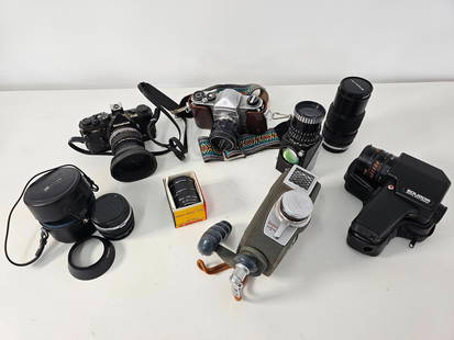 Estate Grouping of Vintage Cameras - 8pc: This lot includes all of the cameras and lenses included in the photos. These are all offered as found in the estate of a professional photographer. Functionality of cameras is unknown.