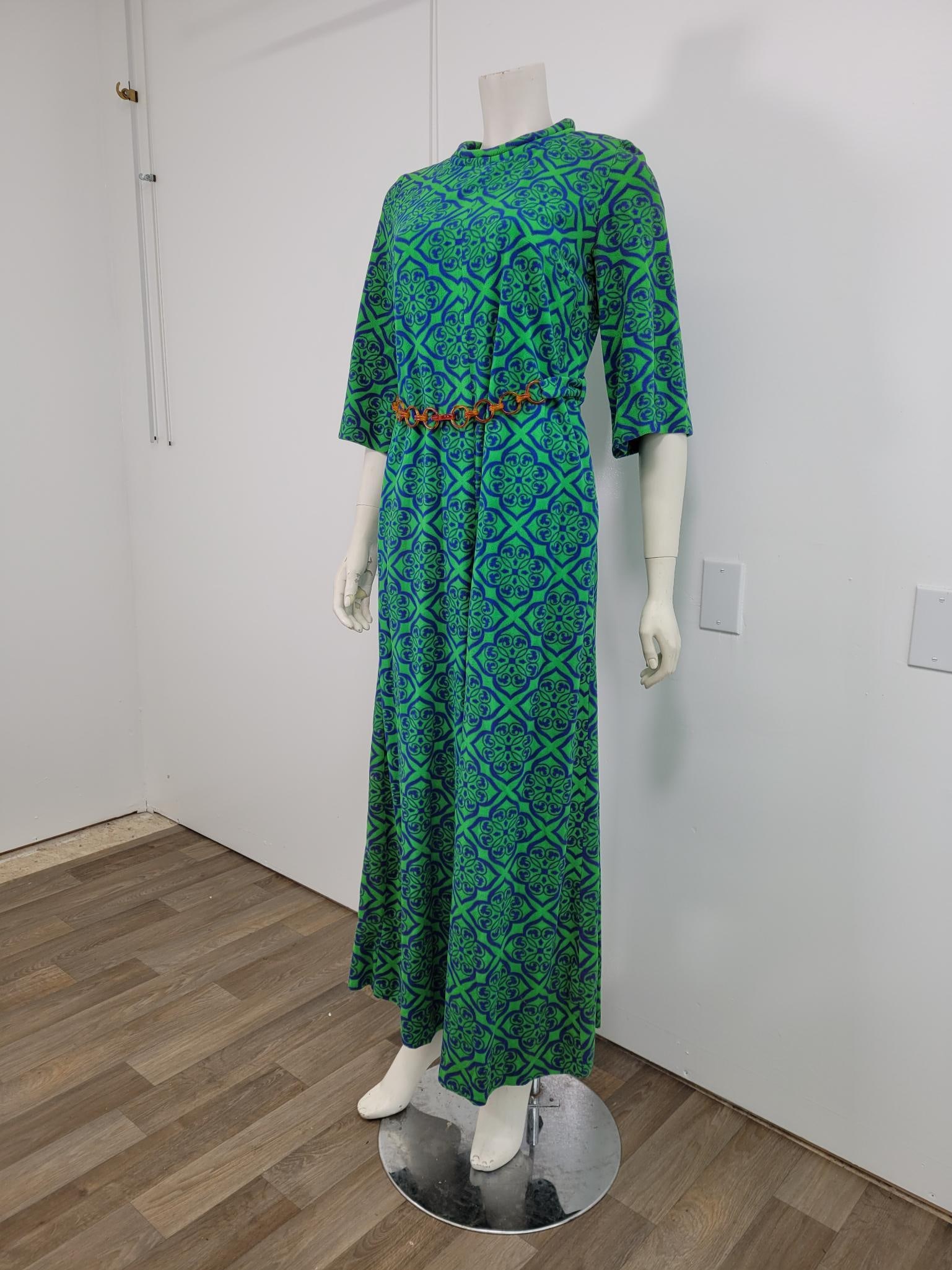 Evelyn Pearson One Piece Wide Leg Loungewear: Description: Evelyn Pearson one piece wide leg lounge suite. Zipper back, snap belt (see photos) pockets. No stains or tears. Measurements: shoulders 15" belt/waist 32" inseam on drop crotch 27"