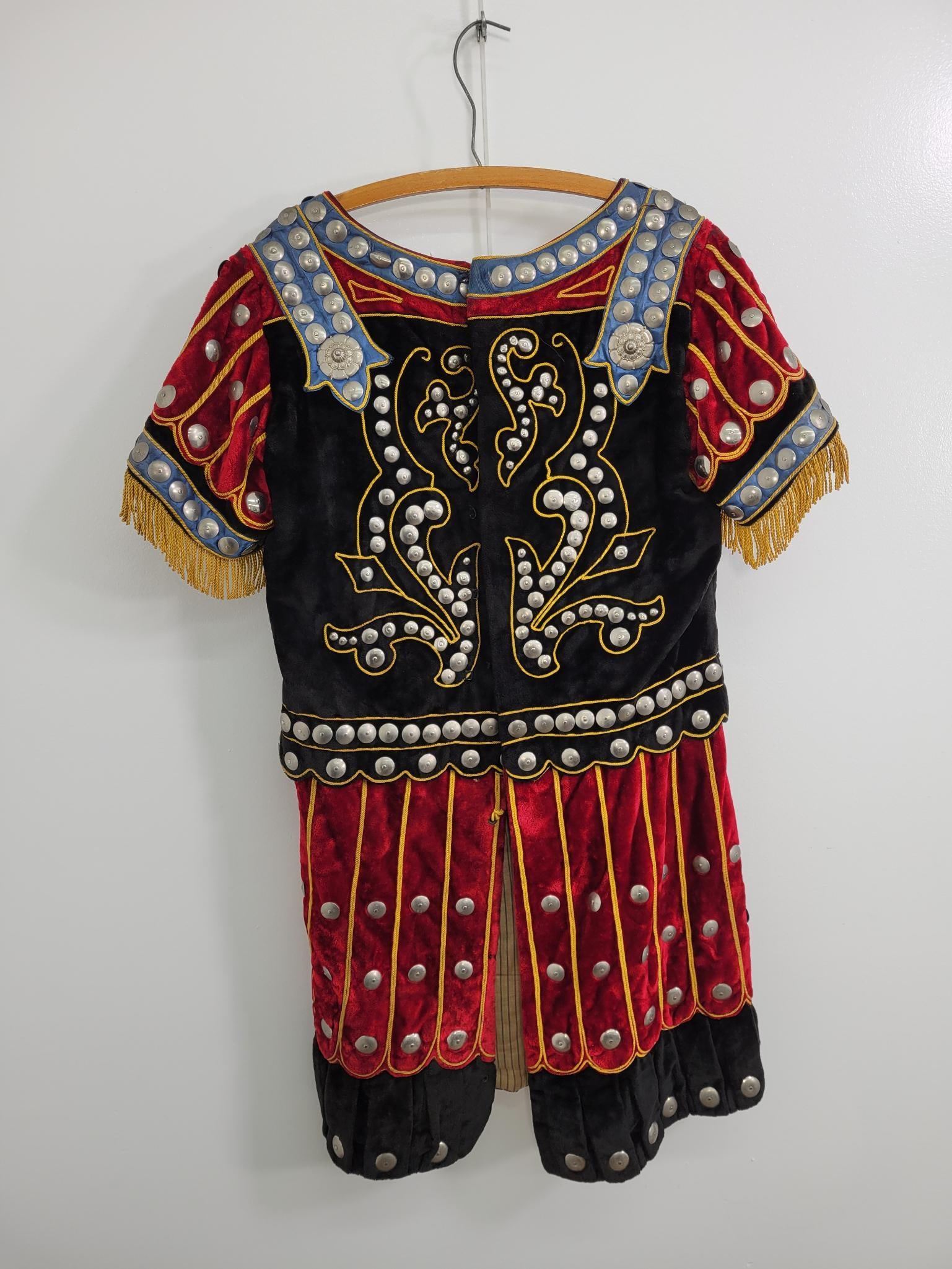 Vintage Roman Soldier Costume: Description: Vintage Roman soldier costume. Mostly made of velvet with real metal accents. Has both snap and hook eye closures. Some wear and discoloration (see photos) but overall in great shape for 