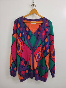 Nell Flowers Knit Sweater: Description: Nell Flowers (By I G Hook) knit multicolored sweater. Has small paint stain and some pulling threads (see photos)Measurements: Size Large