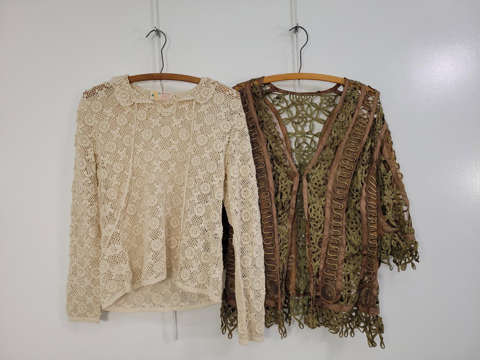 Pair Of Vintage Lace Tops: Description: White lace top 100% cotton handmade in Shanghai. No rips or stains. Green top has some staining and separated seems. (see photos) Measurements: White top size Large, green One Size