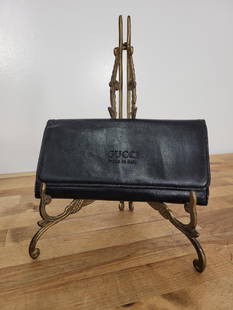 Gucci Made In Italy Leather Wallet: Description: Looks to be a Gucci made in Italy black leather wallet. Has some wear on edges (see photos)Measurements: 7.5" x 4"