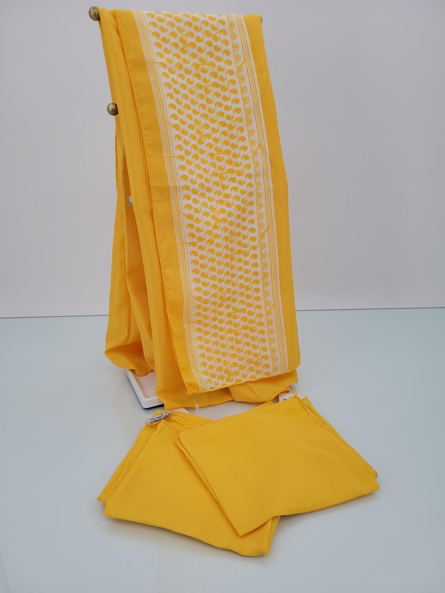 Yellow Silk Scarf Trio: Description: long Estee Lauder white and yellow silk scarf, pair of yellow handkerchiefs by Uzna. No rips or stains Measurements: