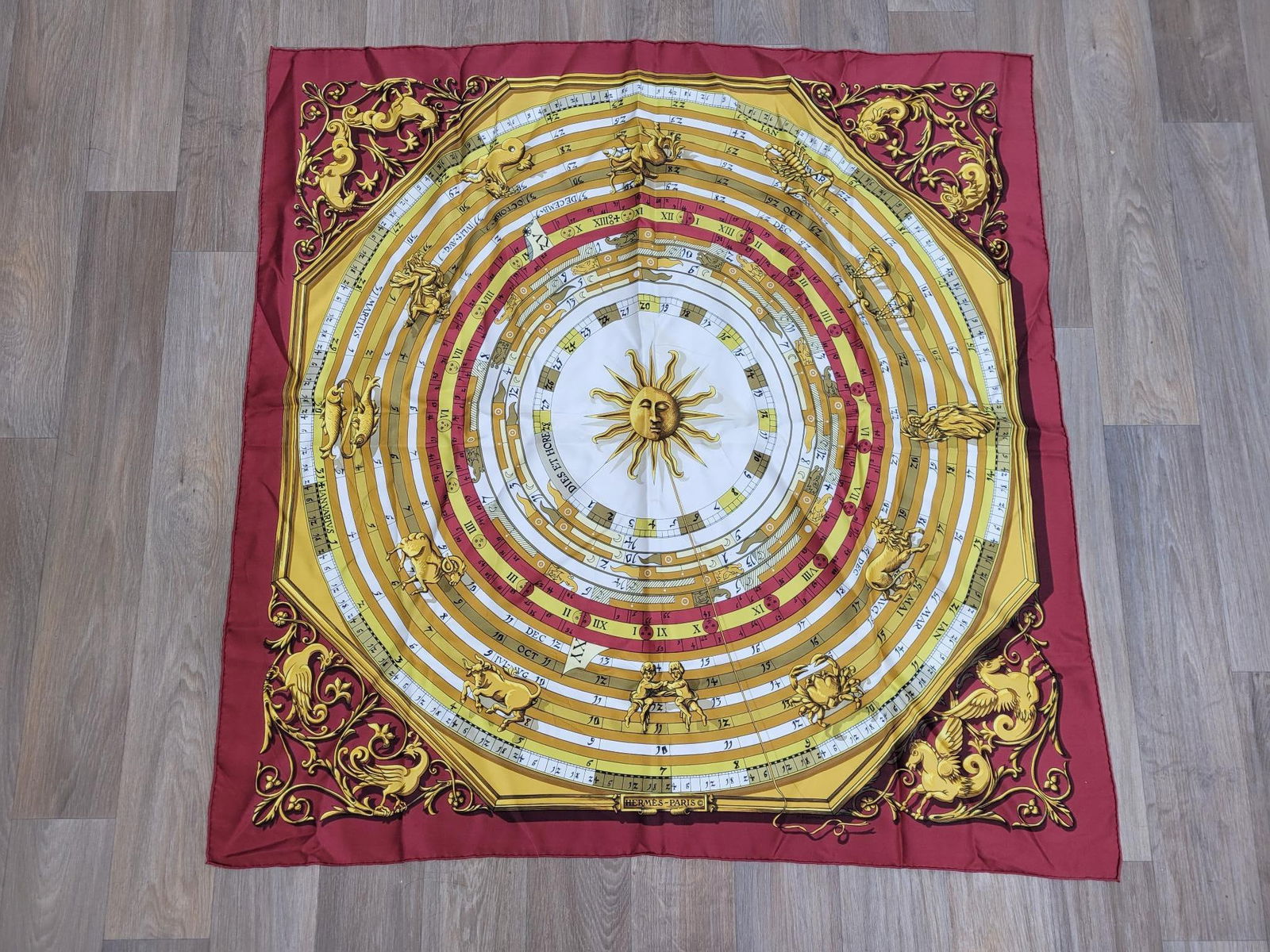 Hermes "Astrologi" By Francoise Faconnet Scarf: Description: Vintage Hermes "Astrologi" silk scarf by Francoise Faconnet. Hand rolled edges. No rips, no stains, some pulling on right side (see photos) Measurements: 35" x 35"