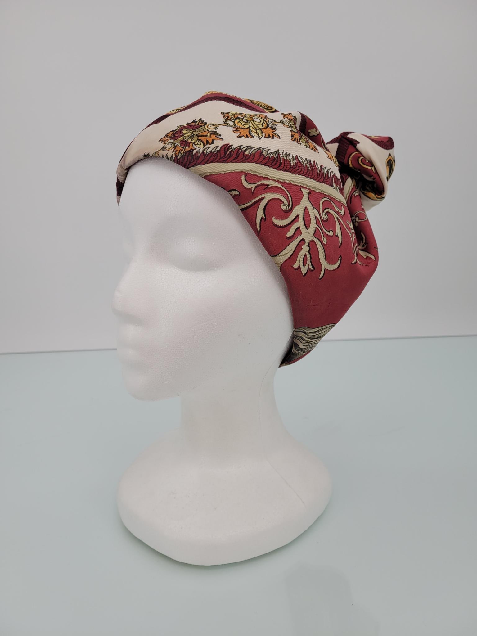 Vintage Hermes Silk Turban: Description: Looks to be and authentic Hermes silk turban. Has some discoloration around the edges (see photos) no rips. Measurements: One Size