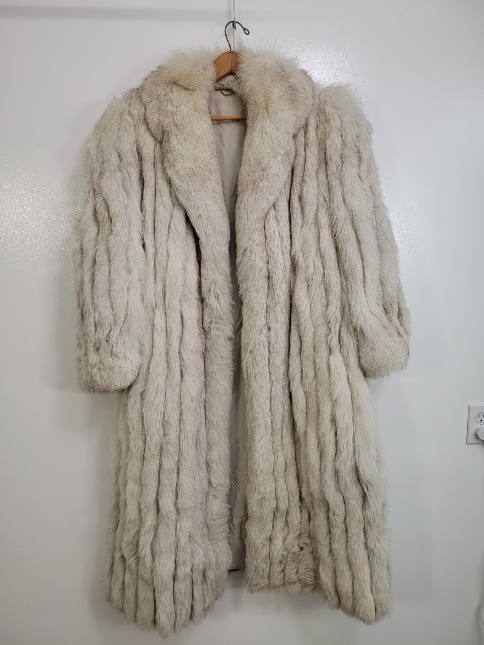 Grey Fur Coat: Description: Long grey fur coat. Some fur is crushed on the back and staining on the lining (see photos) Measurements:
