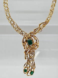 Ilias Lalaounis 18k Gold & Emerald Necklace: This wonderful necklace by Ilias Lalaounis features a naturalistic chain design leading to 3 inset emeralds at the bottom. The entire piece is made of 18k yellow gold and is signed on the clasp. 