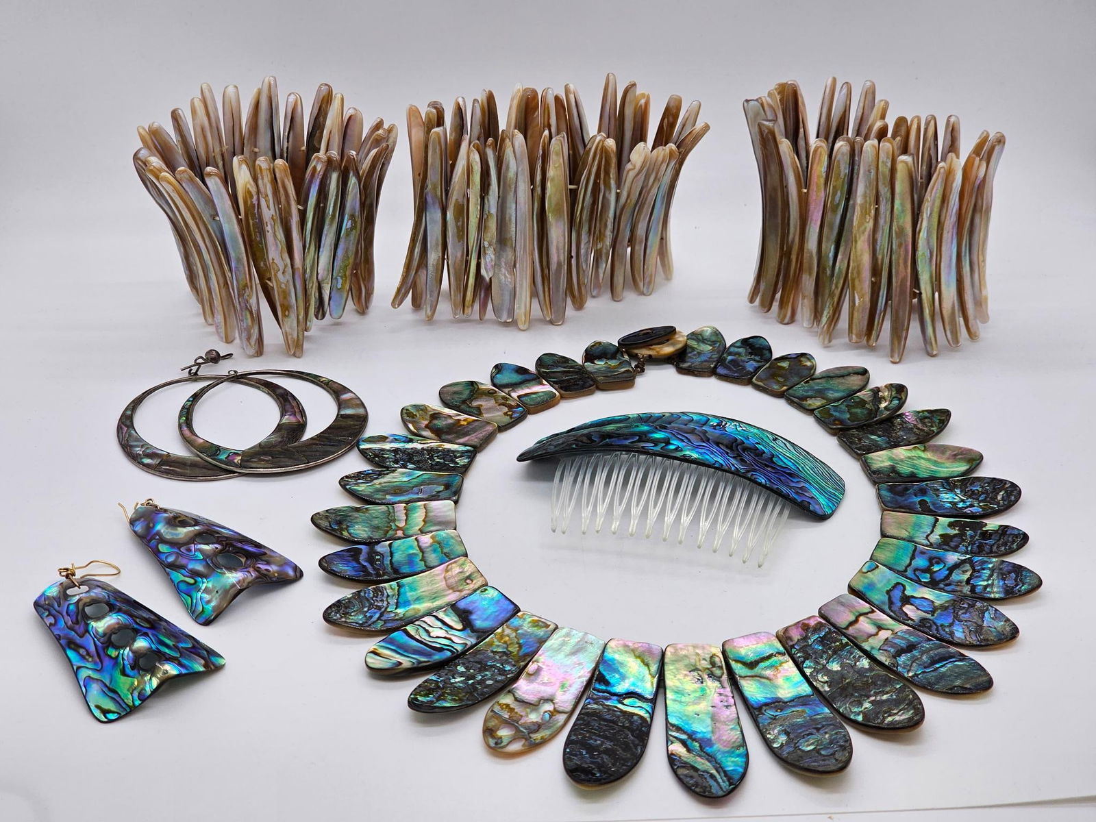 Estate Lot of Vintage Abalone Jewelry: This lot includes a wonderful selection of assorted abalone jewelry, from cured collars, to earrings and bracelets. You get everything you see in the photos, most pieces appear vintage in age. See pho