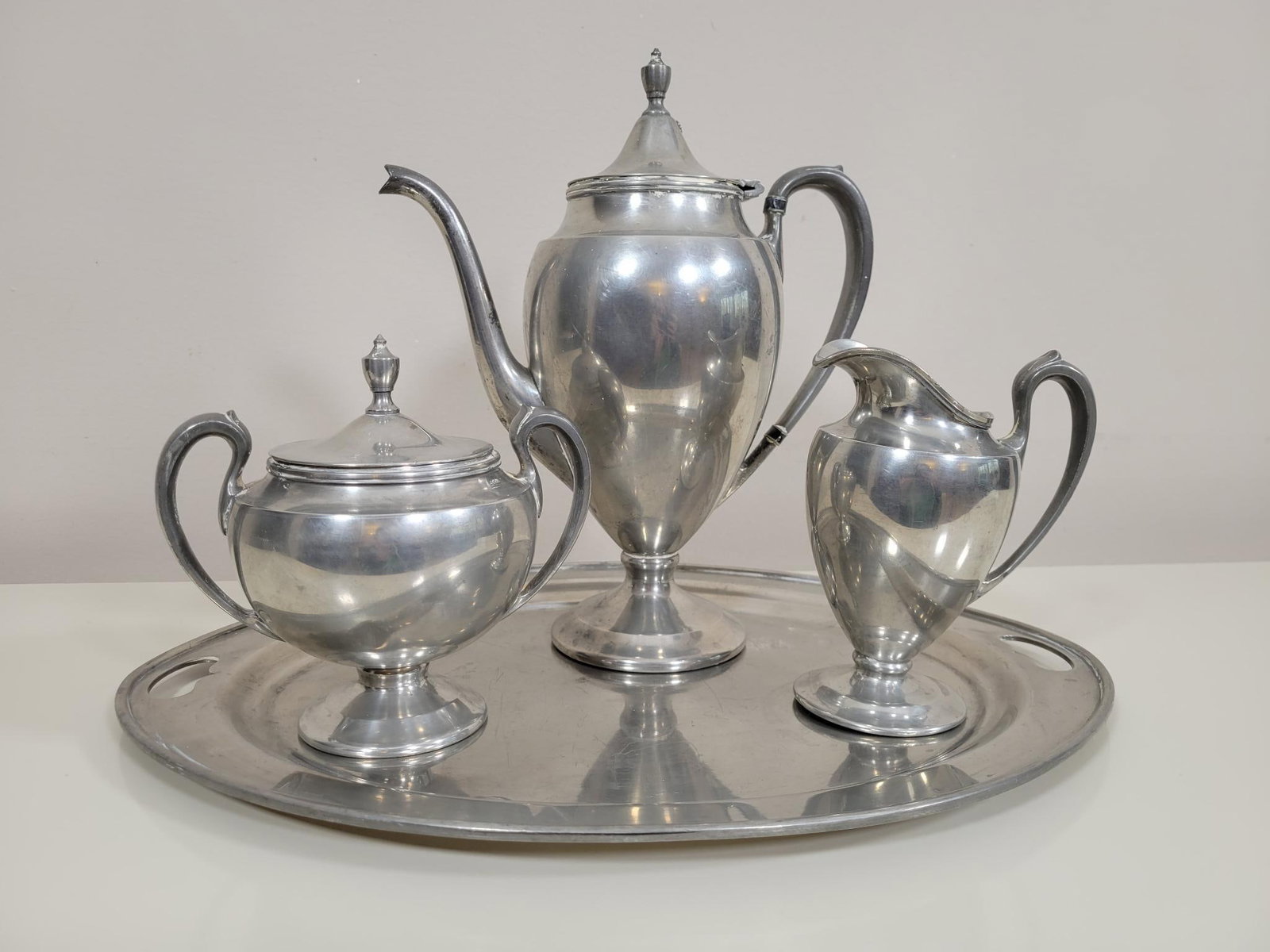 Insico Pewter Set: Lot includes a small tea service, see photos for lot contents and details Measurements: Tallest piece is 11"H Transport Fee $25