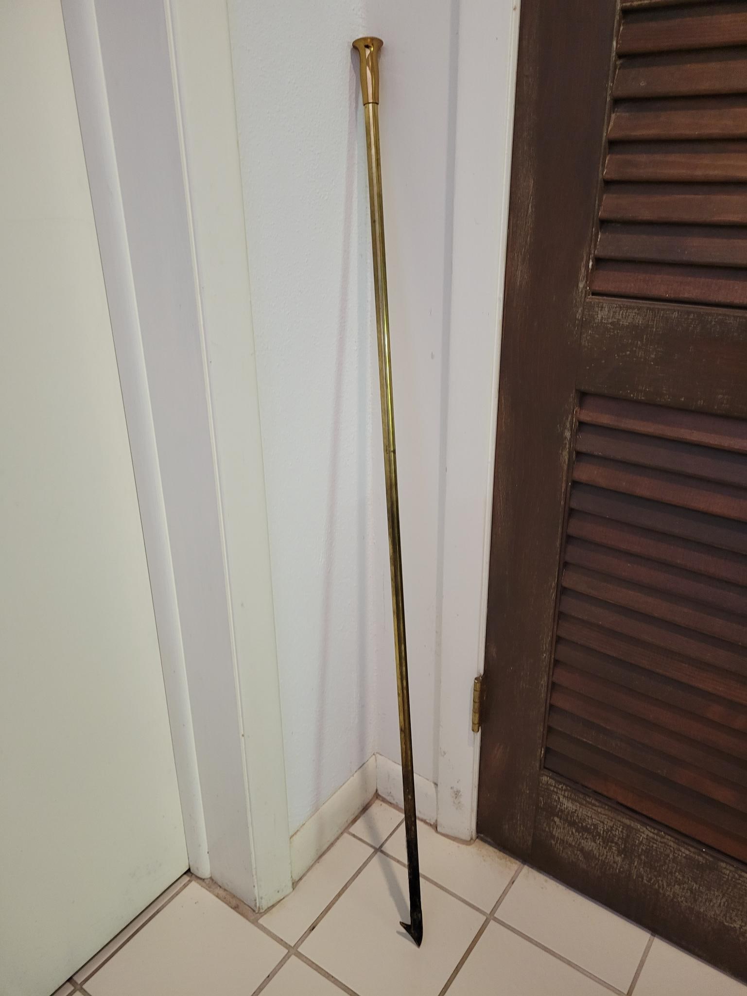 Vintage Brass "Blo-Pole" Fireplace Tool: Tool is made of brass and marked at the top "Blo-Pole by William T. Burt", appears vintage in age and in overall good used condition. Measurements: 46.5"L x 1.5"W Transport Fee $25