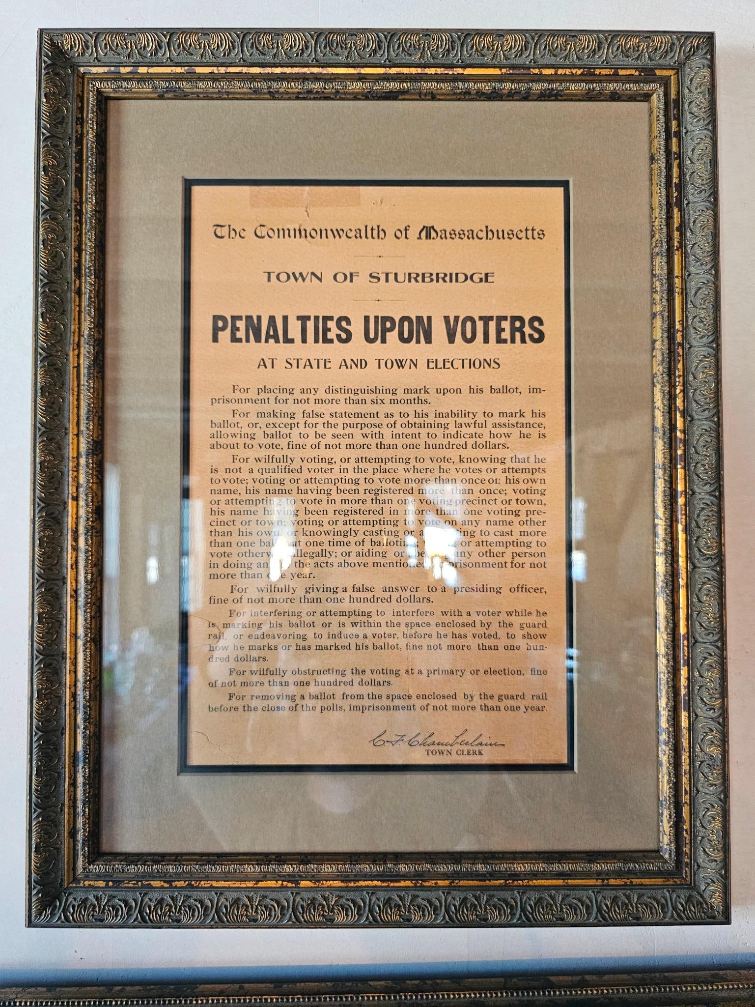 Framed Penalties Upon Voters Ephemera: The Commonwealth of Mass- Penalties upon voters at state and town elections write up, signed by the town clerk at the time and professionally framed. Appears to be 20th century in age. Measurements: 1