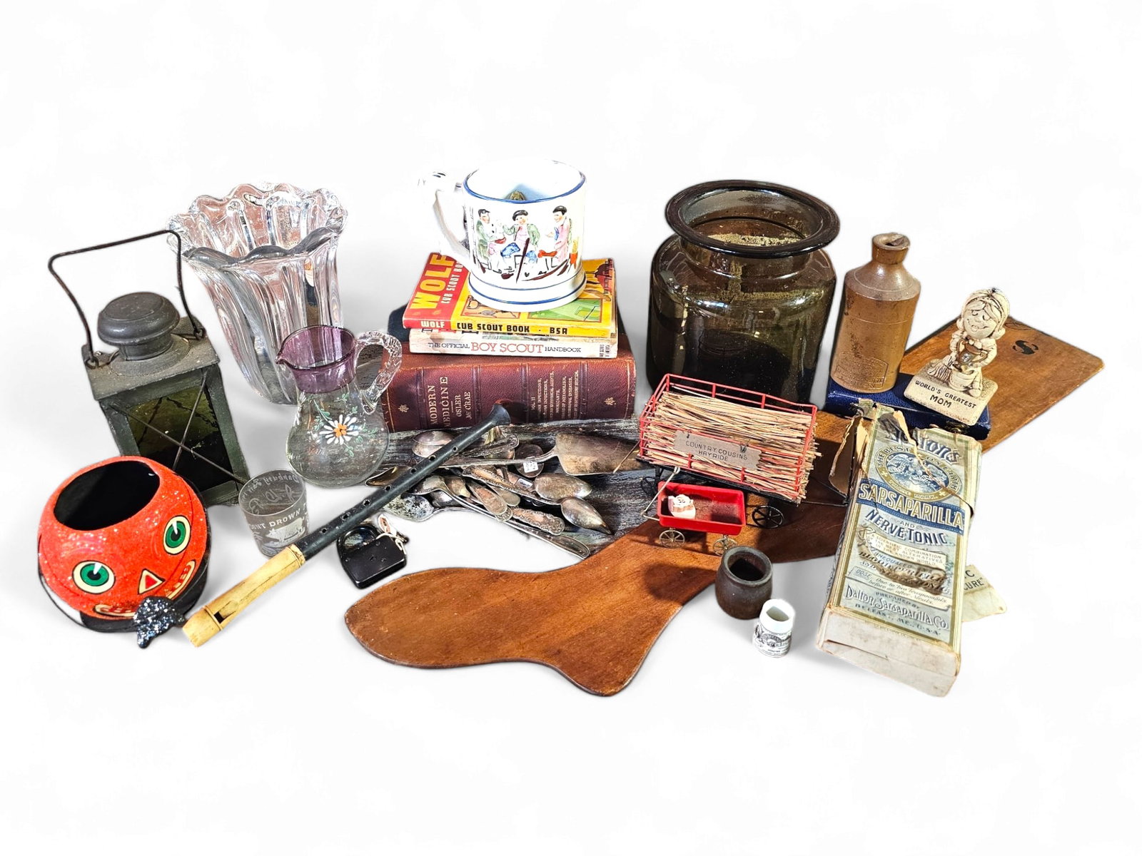 Estate Lot of Antiques & Collectables: This grouping includes everything seen in the photos. Highlights of this lot include a Antique Staffordshire Frog Tankard, Antique Bottle in original box, and a vintage pumpkin Halloween bucket. Every