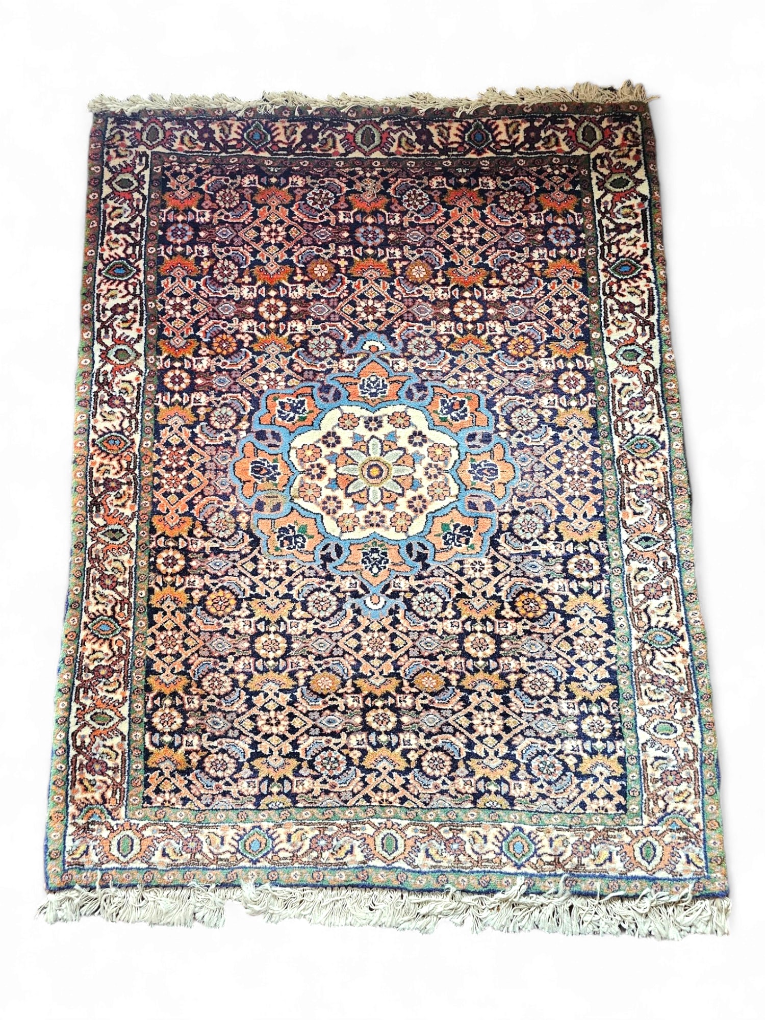 Antique Persian Oriental Rug - 43" x 31": Rug is hand made and antique in age and of good quality. All of the rugs were purchased at auctions throughout New England over the last 30 years. The condition of the rug is fair, with fading and los