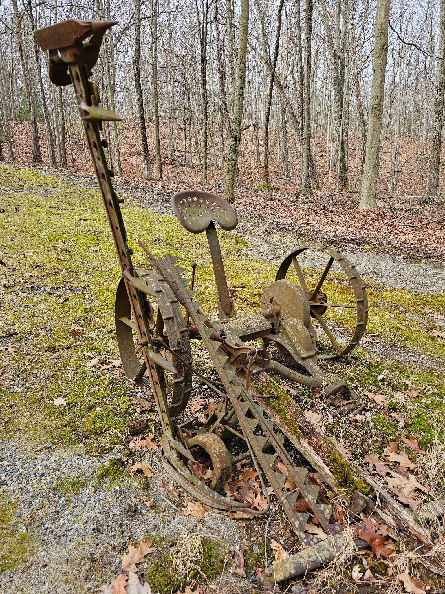 Antique John Deere No. 3 Sickle Mower: This lot includes a large antique farm implement used as a lawn decoration, see lot photos for lot condition and details. We will have a machine on sit to aid in removal, but please ensure to bring th