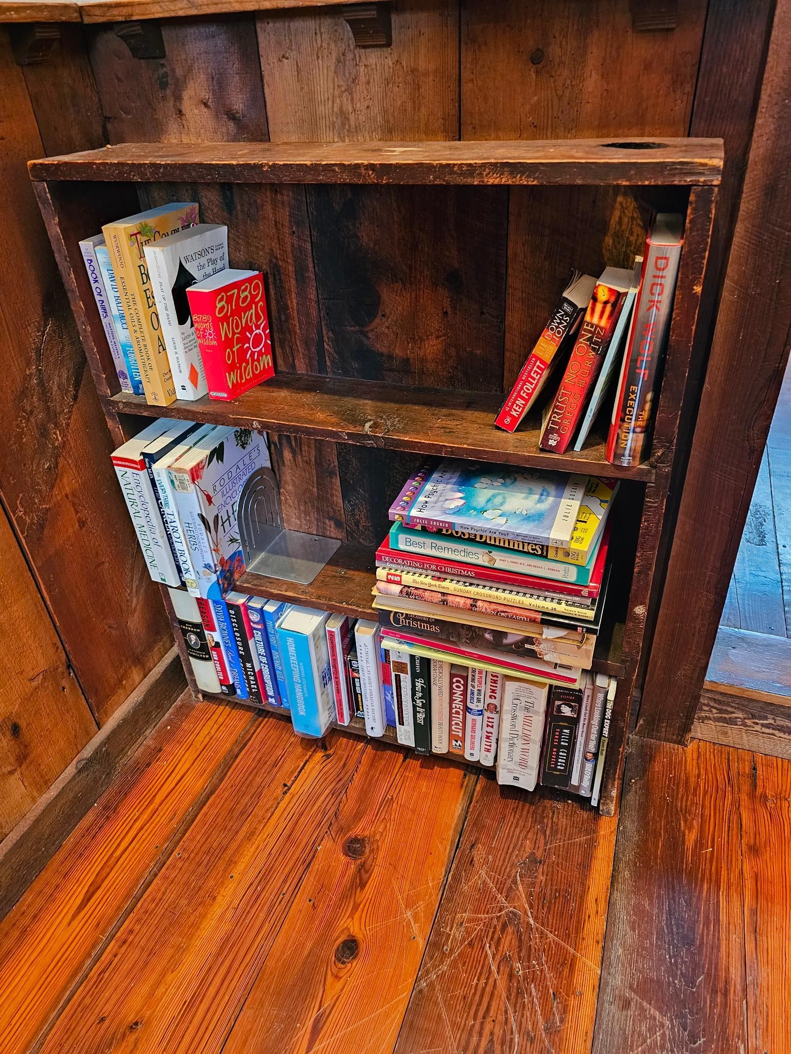 Reclaimed Barn Wood Bookshelf: This lot includes the reclaimed barn wood bookshelf as well as all of the books inside of it. The bookshelf itself is very well made and of good quality, see lot photos for condition, contents, and de