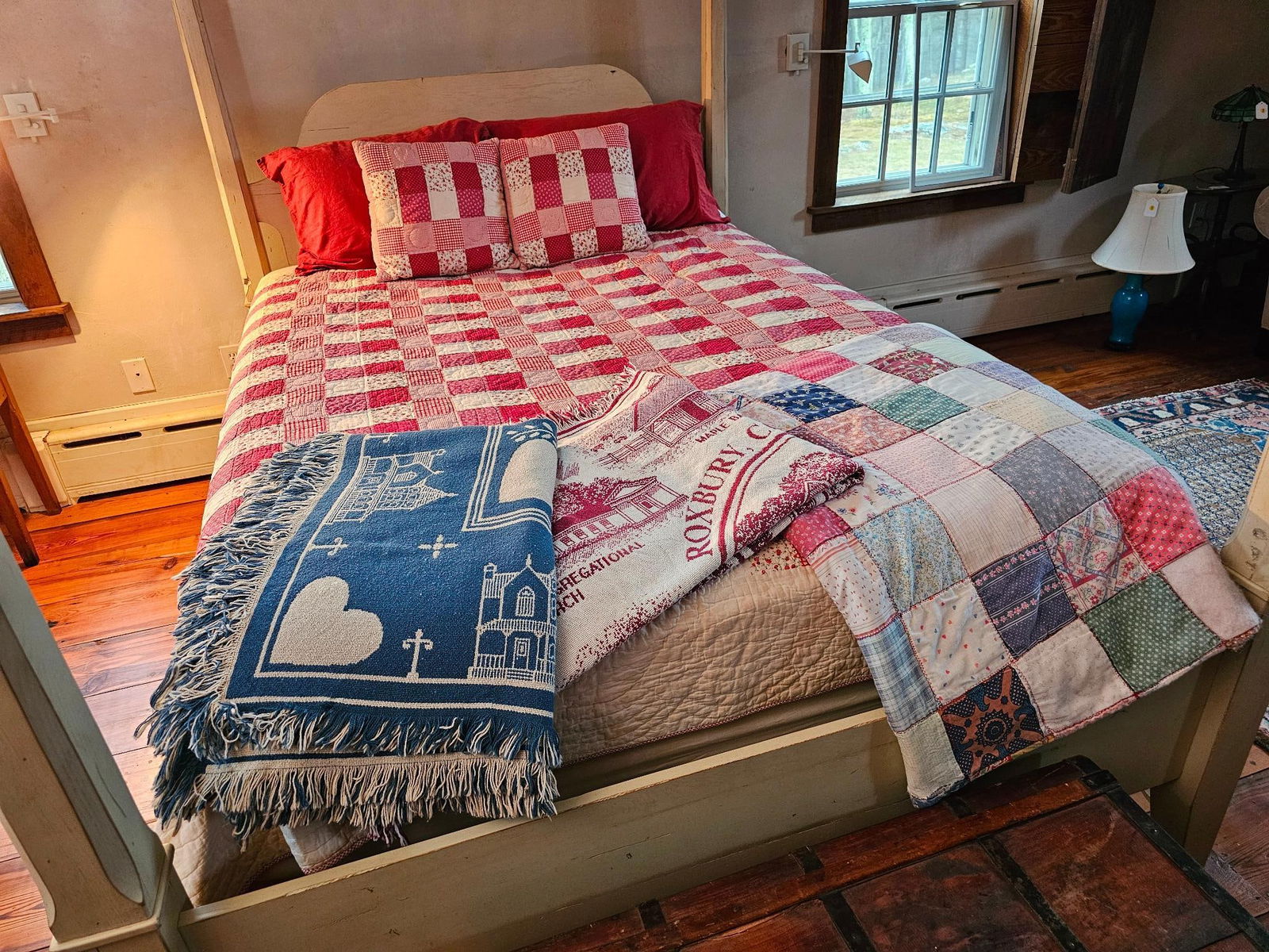 Vintage Queen Size Quilted Bed Spread: This lot includes the whole queen sized bed spread seen in the photos. The comforter is a patchwork quilt with matching style pillow cases. Also includes 2 Local Roxbury blankets, and a second patchwo