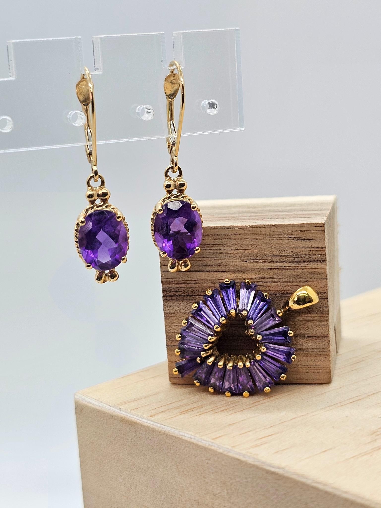 Sterling Silver & Amethyst Jewelry Set: This lot includes a set of gold plated sterling silver set with amethyst stones. The heart shaped necklace pendant is marked on the back. See photos for lot details, measurements, and conditions.