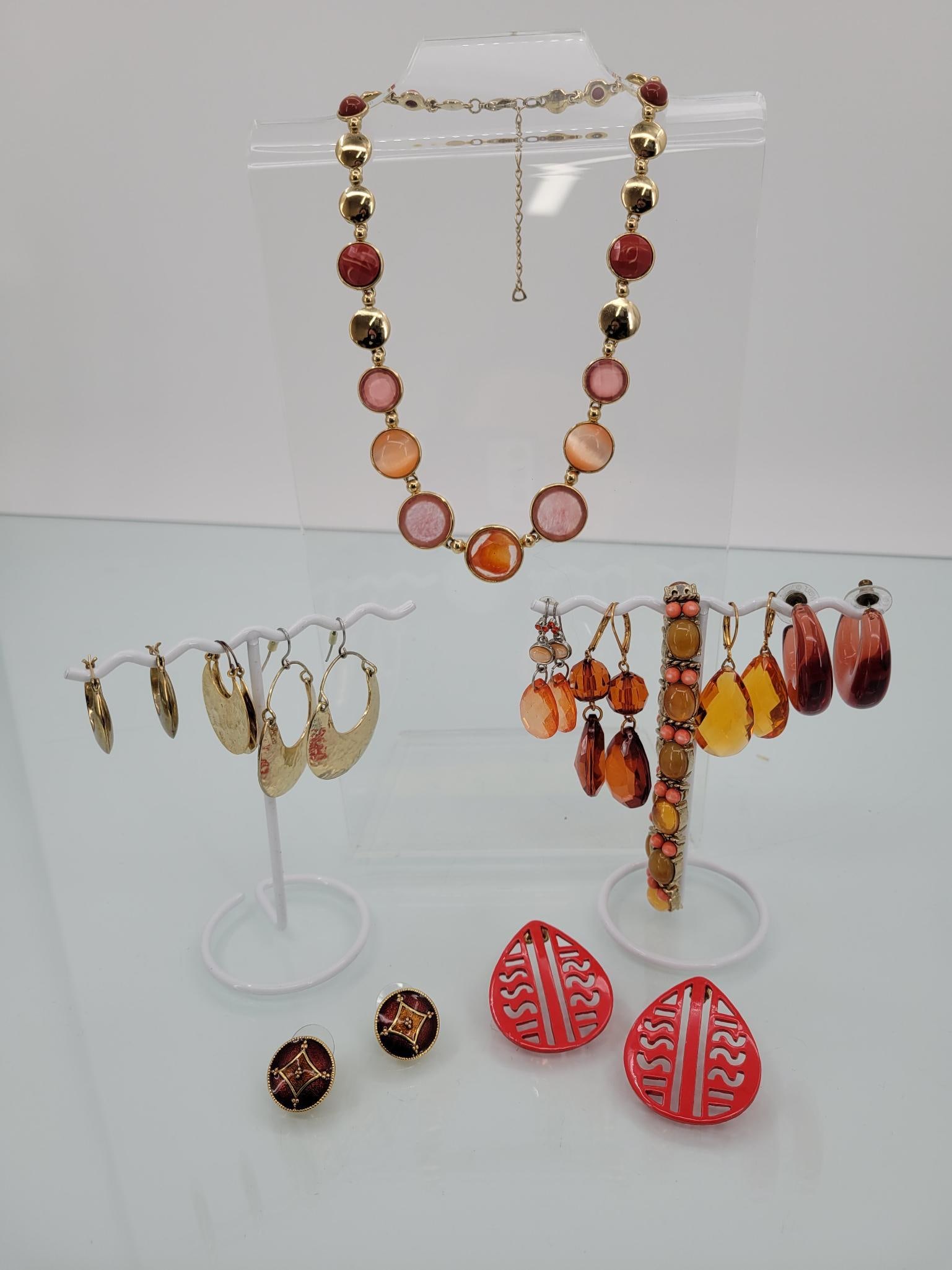 Just Peachy Jewelry Lot: Description: this fantastic peach toned lot is packed with dangly earrings, three pairs of gold toned hangers and four peachy hangers, and two festive posts. Also included is a matching necklace and b