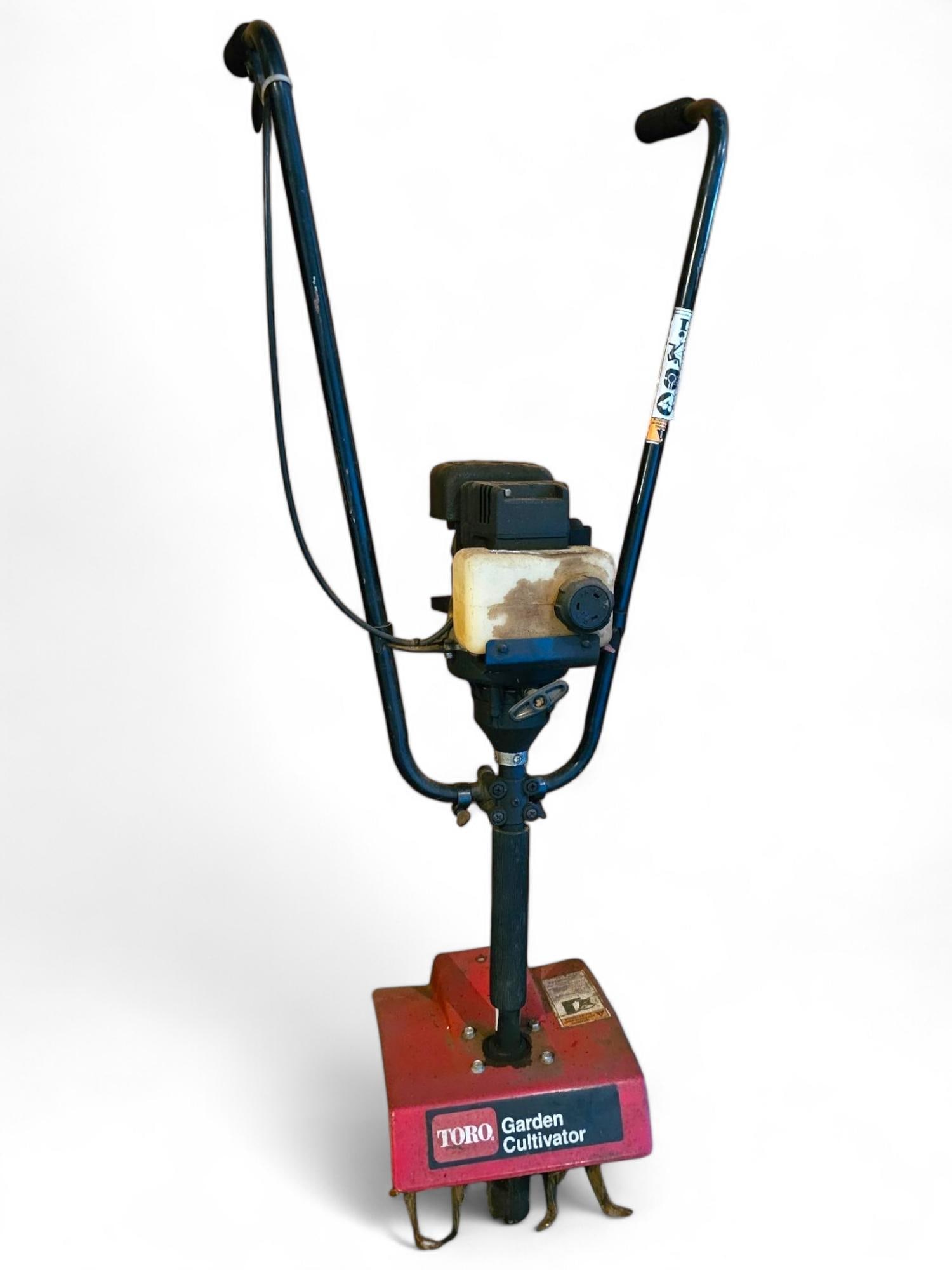 Gas Powered Toro Garden Cultivator: The cultivator is in estate found condition, does appear to have compression however we did not test the machine. Sold As-Is Where-Is in untested condition. See Lot Photos for Dimensions and Measureme