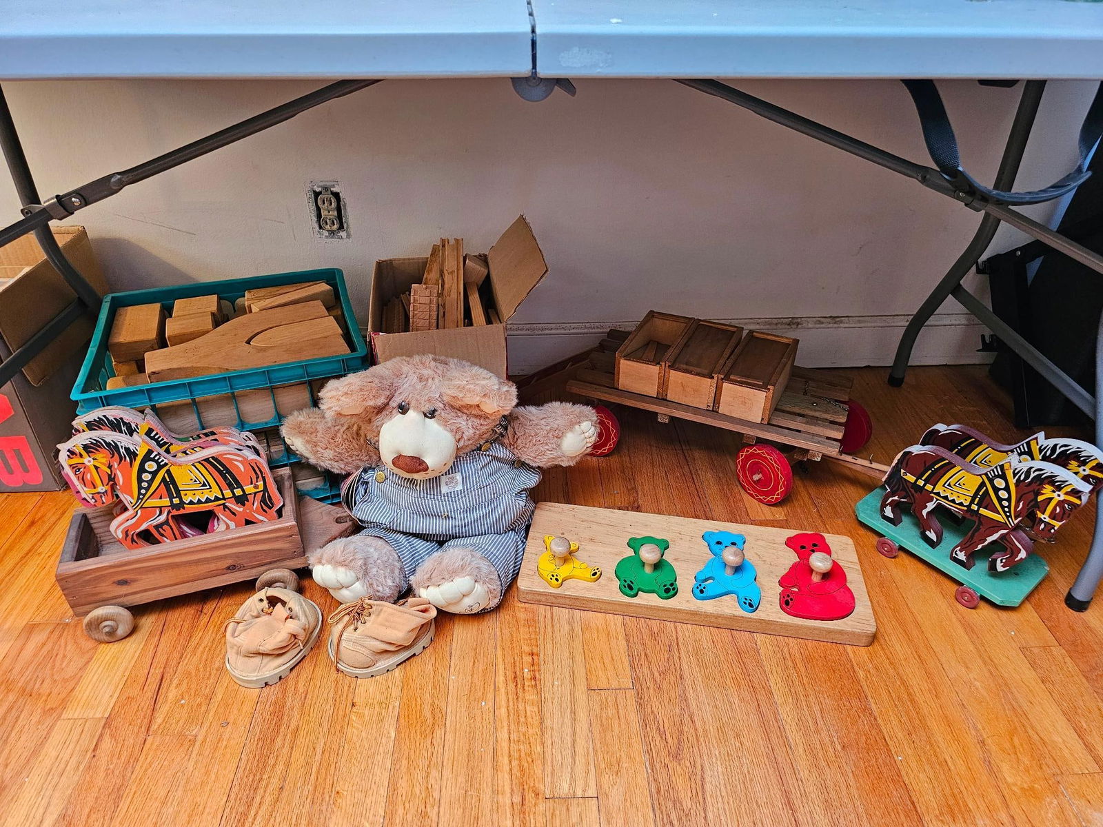 Vintage Wooden Toy Collection: A collection of vintage toys, including wooden pull toys, plush animal, and wooden building blocks. Offered in estate-found condition. Please refer to photos for further details on the lot's condition