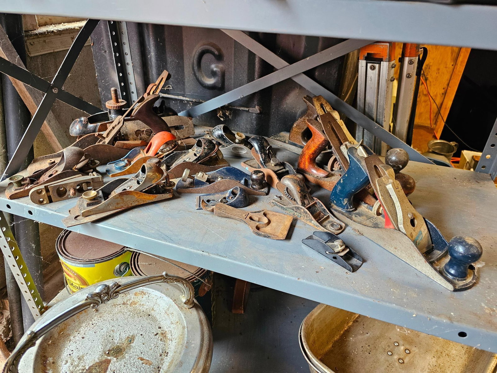 Collection of Vintage Metal Hand Planes: Group of vintage metal hand planes, including various sizes and models. Perfect for woodworking enthusiasts or collectors. Offered in estate-found condition, showing signs of use, rust, and wear. Plea