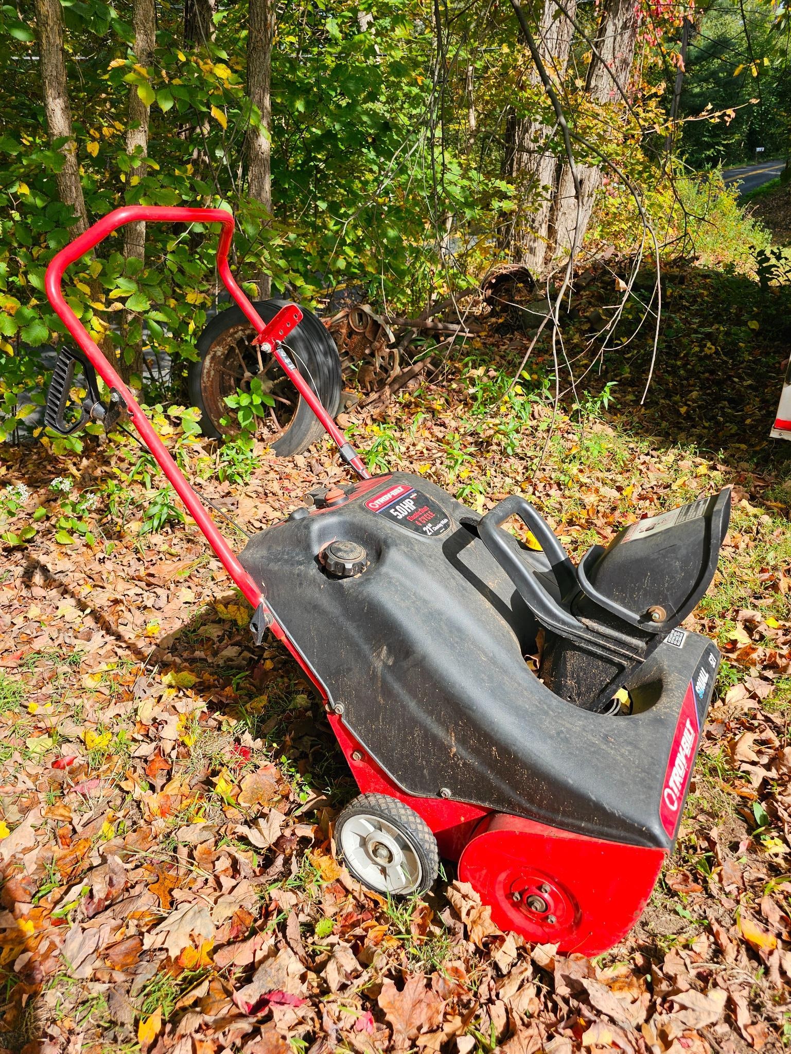 Troy Built Squall 521 Snow Blower: Troy Built snow blower. Visible wear and rust consistent with age. Mechanical condition is unknown. Offered in estate-found condition. Please refer to photos for more details.Cost to transport this lo