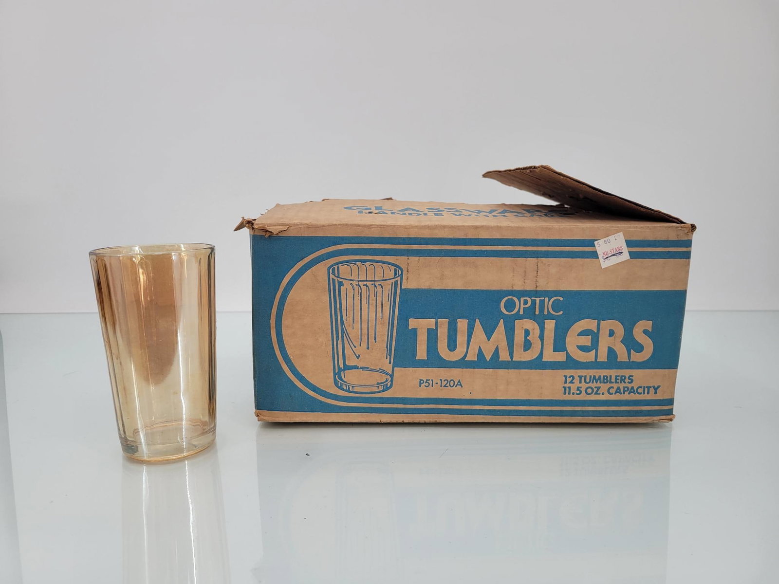 Set Of 10 Marigold Optic Tumblers (New In Box): Maker: Optic Pattern: Marigold tumblers Condition Issues (If Any): missing two from box Measurements: 2.75 "L x 5 "H Condition Buyers Premium: 28% For this auction, weA