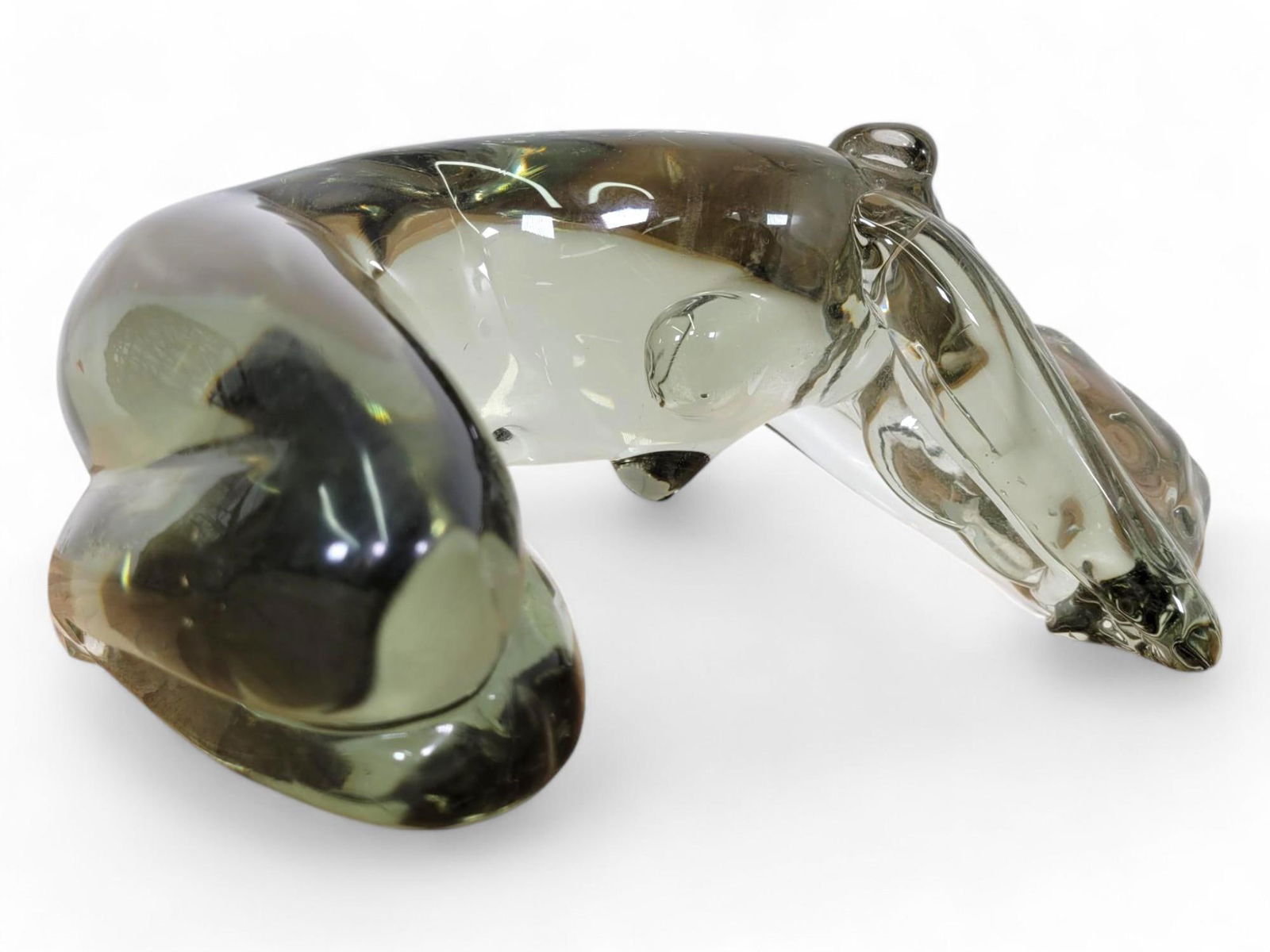 Loredano Rosin "Vergogna Distesa" Murano Glass: A sleek and dynamic glass nude women sculpture titled "Vergogna Distesa" by artist Loredano Rosin (Signed). The glass is smoky transparent glass. A striking sculptural piece with modern appeal from th