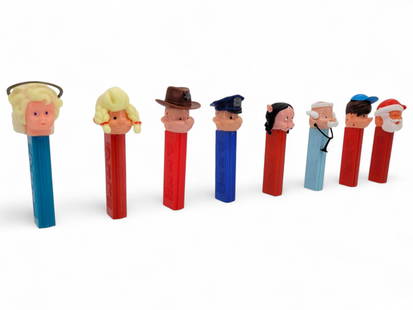 8pc. Vintage Pez Dispensers: 8pc. Lot of vintage Pez dispensers. Each dispenser is in good estate found condition. All dispensers have no feet. Manufacturer locations and ages vary. See photos for details. Tallest Measures: 4.75