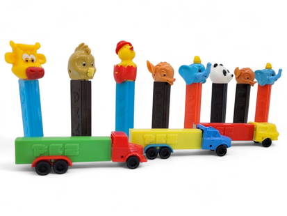 11pc. Vintage Animal & Truck Themed Pez Dispensers: 11pc. Lot of vintage Pez dispensers. Each dispenser is in good estate found condition. 10/11 dispensers have no feet. Manufacturer locations and ages vary. See photos for details. Tallest Measures: 4.