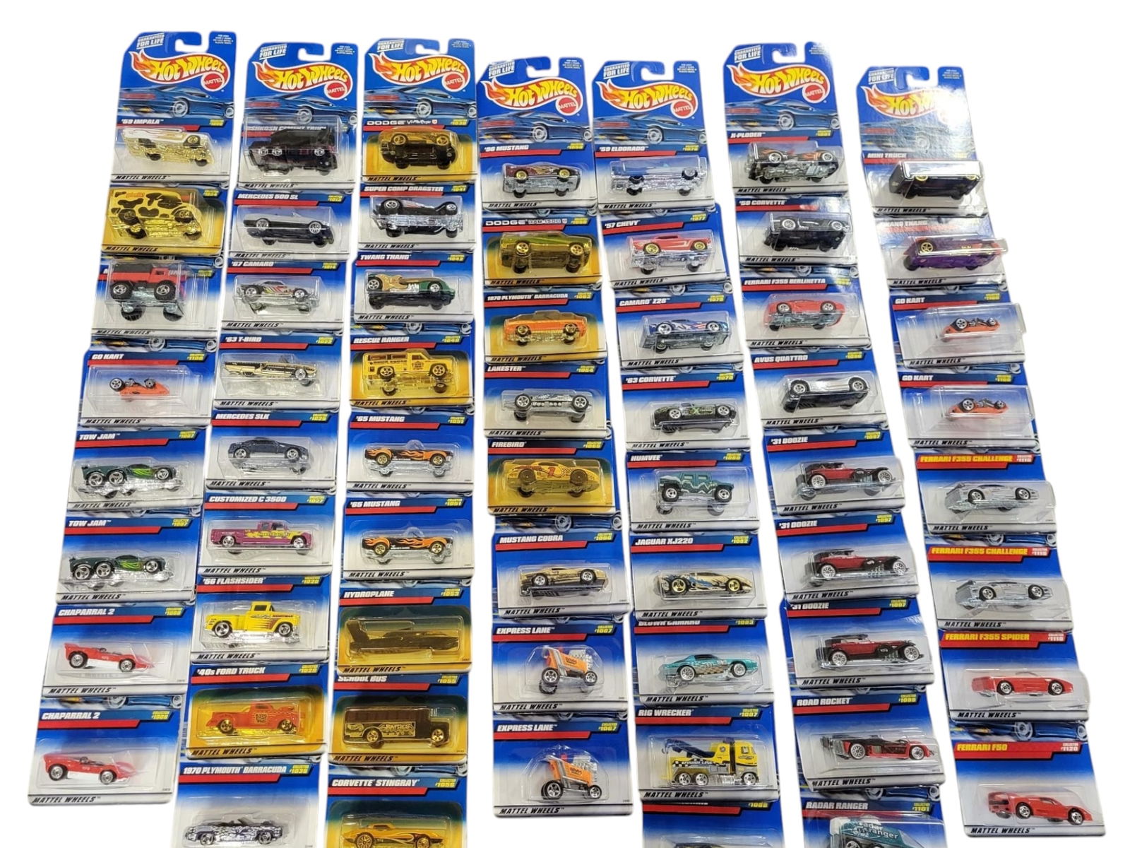 60pc. 90's Hot Wheel Cars - In Box: This lot includes a collection of Hot Wheels toy cars, in sealed original packaging. Includes 60 pieces. All from the 1990's. See photos for lot details, contents and conditions. All items sold in est