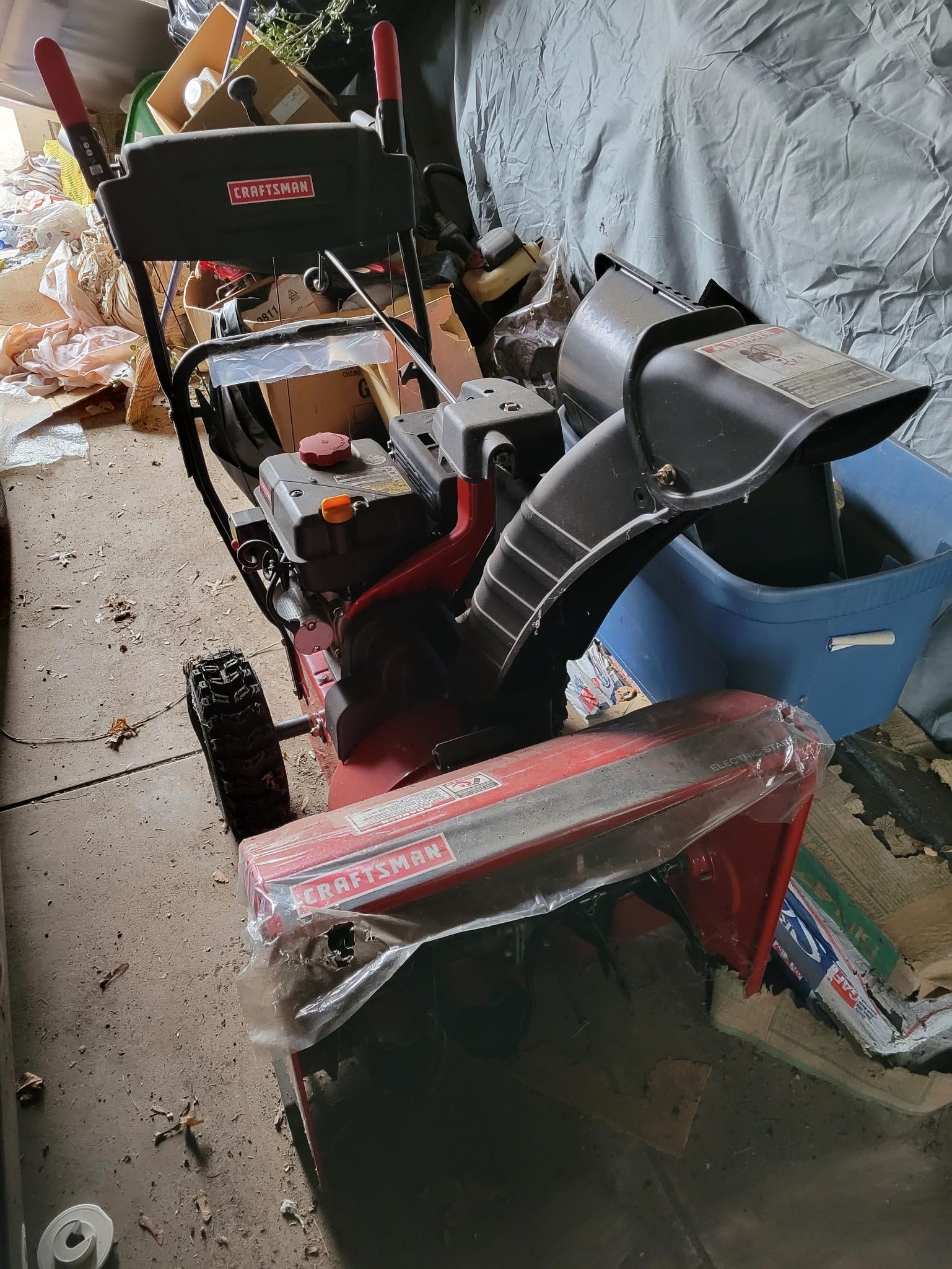 NEVER USED - Craftsman 24" Snow Blower Model 247.881730: This lot includes a Craftsman 24" Snow Thrower Snowblower machine. The machine is basically brand new, having been bought years ago and never used. It has been stored in the garage, s
